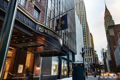 a building on a city street with a sign for the west institution at Westgate New York Grand Central in New York