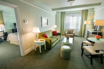 a hotel room with a couch and a bed at Hotel Beacon in New York