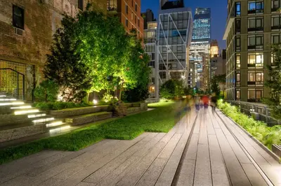 a street in a city at night with buildings at Holiday Inn Express NYC Chelsea - NoMad Area by IHG in New York