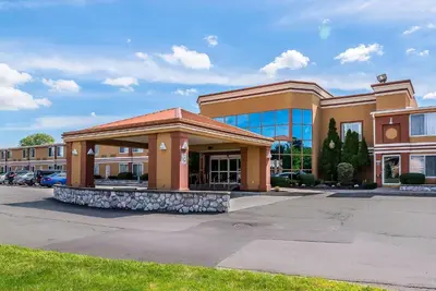 a large building in front of a parking lot at Quality Inn & Suites Albany Airport in Latham