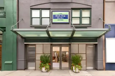 a building with a sign that reads the santa sophia store at Solita Soho Hotel in New York