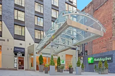 a glass stairway in front of a building at Holiday Inn Manhattan 6th Ave - Chelsea by IHG in New York