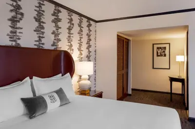 a hotel room with a bed and a desk at Omni New Haven Hotel at Yale in New Haven