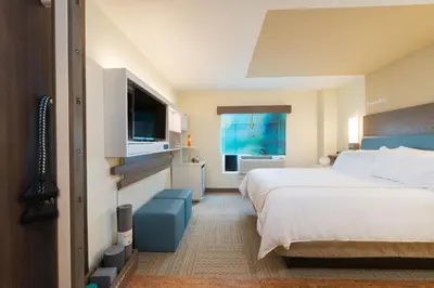 a hotel room with a bed and a television at EVEN Hotel Norwalk by IHG in Norwalk