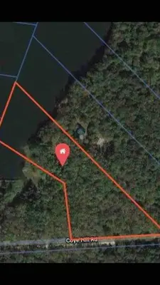a map with a red heart on the ground at Hidden Lakefront Retreat in Sherburne