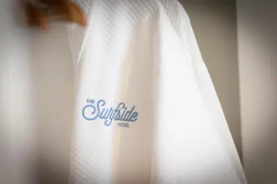 a white curtain with the couture veil on it at The Surfside Hotel in Stratford