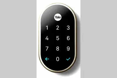 a smart remote control with a visa sign on it at Contemporary 3 Bedroom Apt with Sauna in Woods in Armonk