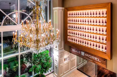 a chandelier in a store with a sign that says blue wonder at The Westin Governor Morris, Morristown in Morristown