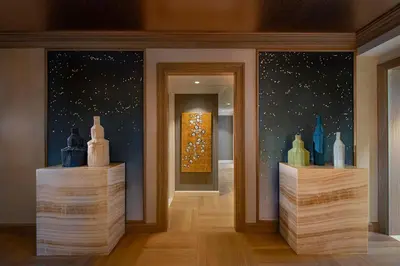a room with a wall with a painting of stars at JW Marriott Essex House New York in New York