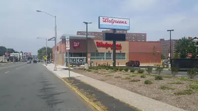 an empty street in front of a wal mart at 500 Estates LLC in Irvington
