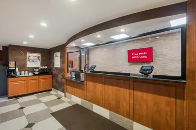 a waiting room with a sign that reads not wait atlords at Red Roof Inn Fairfield in Fairfield