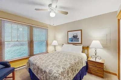 a bedroom with a bed and a ceiling fan at Northridge 467 in Tannersville
