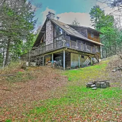Stamford Lakefront Home with Dock and Wraparound Deck!