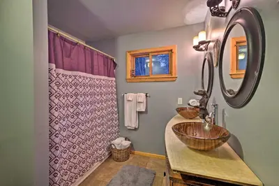a bathroom with a sink and a shower at Jewett Cabin with Viewing Deck - 10 Mins to Skiing! in Jewett
