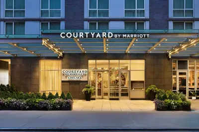 a court yard by marriott building with a sign on it at Courtyard by Marriott New York Manhattan/Chelsea in New York