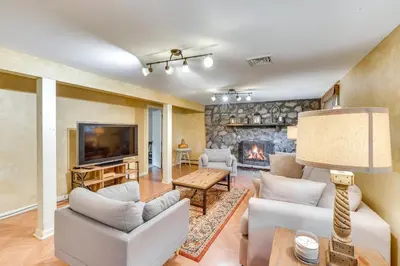 a living room with a couch and a fireplace at Hudson Valley Horse Farm Retreat in Salt Point in Salt Point