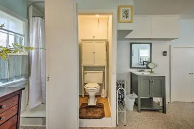 a bathroom with a toilet and a sink at Charming Tivoli Home with Patio, by Town and Shops in Tivoli