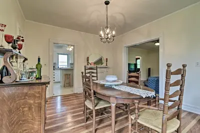 a dining room with a table and chairs at Millburn House with Deck - Walk to NYC Transit! in Millburn