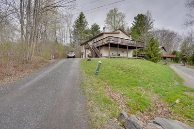 a house on the side of a road at Catskills Home, 5 Mins to Windham Mtn Resort! in Windham