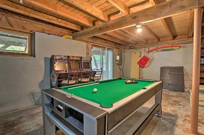 a garage with a pool table in a room at half Mi to Hideout Ski Lake Ariel Resort Home! in Lake Ariel