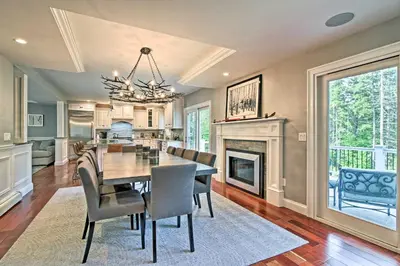 a dining room with a table and chairs and a fireplace at West Dover Home - 3 Miles to Mount Snow Resort! in West Dover