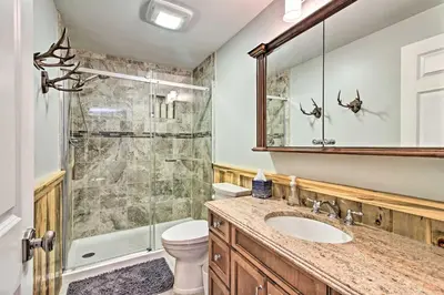 a bathroom with a shower and a sink and a toilet at West Dover Home - 3 Miles to Mount Snow Resort! in West Dover