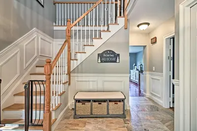 a home with a staircase with a bench in a hallway at West Dover Home - 3 Miles to Mount Snow Resort! in West Dover
