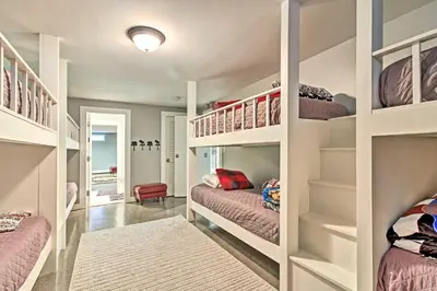 a room with two bunk beds and a hallway at West Dover Home - 3 Miles to Mount Snow Resort! in West Dover