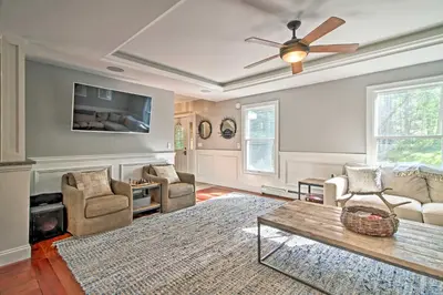 a living room with a couch and a ceiling fan at West Dover Home - 3 Miles to Mount Snow Resort! in West Dover