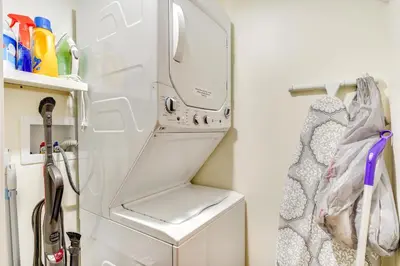a refrigerator with its door open in a kitchen at Manchester Center Home with Green Mtn Views! in Manchester Center