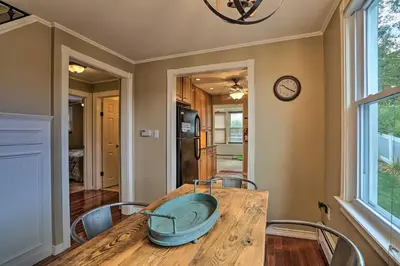 a dining room table with a bowl on top of it at Lake Hopatcong Family Home with Boat Slip and Dock in Hopatcong