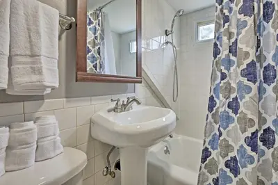 a bathroom with a sink and a toilet and a shower at Beautiful Lenox Home, 3 Mi to Shakespeare and Co! in Lenox