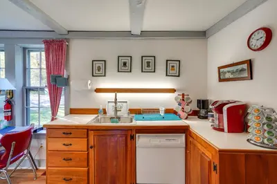 a kitchen with a sink and a counter top at Tranquil 3 BR Stockbridge House with Private Deck! in Stockbridge