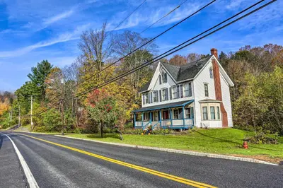 a house sitting on the side of a road at Catskills House 1 Mi to Windham Mountain Resort! in Windham