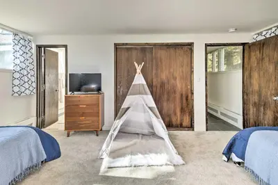 a bedroom with two beds and a teepee at Pristine West Dover Home with Deck and Mountain Views! in West Dover