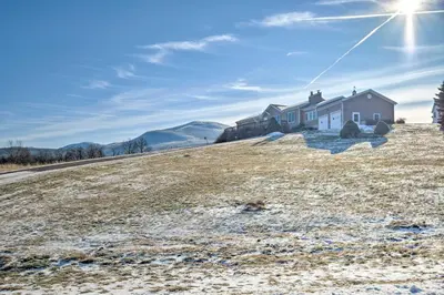a house on a hill in the snow at Catskills Mtn Retreat with Panoramic View and Fire Pit in Cornwallville