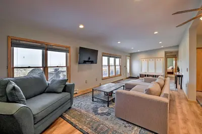 a living room with two couches and a tv at Catskills Mtn Retreat with Panoramic View and Fire Pit in Cornwallville