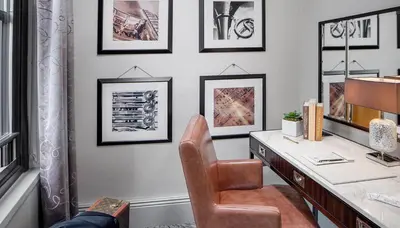 a home office with a desk and a chair at WestHouse Hotel New York in New York