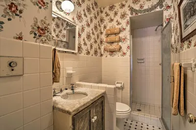 a bathroom with a sink and a toilet at Historic House with Record Player, Walk to Downtown! in Roxbury
