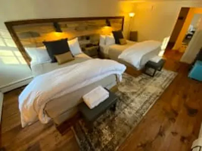 a large bedroom with two beds in it at Farm Road Estate in West Dover