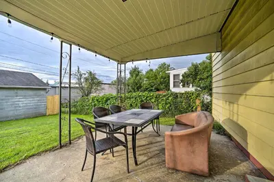 a patio with a table and chairs on it at Albany Home with Fenced Yard and Patio - Pets Welcome! in Albany