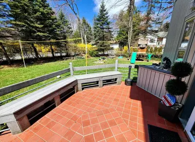 a porch with a bench and a volley ball at Paradise in heart of Poconos FaSt InTeRnEt Close to All Attractions in Pocono Summit