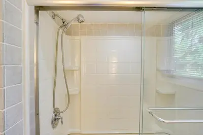 a shower with a glass door in a bathroom at Relaxing Catskills Apt Less Than 3 Mi to Windham Mountain! in Windham