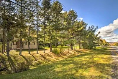 a road with trees on the side of a house at Spacious Apt with Yard 3 Mi to Windham Mountain in Windham