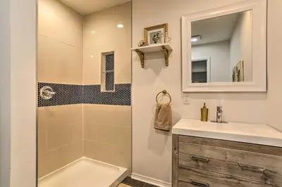 a bathroom with a shower and a sink at Hot Tub, Fire Pit and Resort Perks Tobyhanna Home! in Tobyhanna