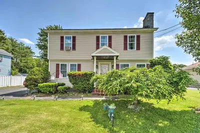 a white house with red shutters at Stylish Suburban Getaway, 10 Miles to Royal Mtn! in Johnstown