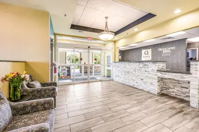 a lobby of a hospital with chairs and a counter at Rodeway Inn Poughkeepsie in Poughkeepsie