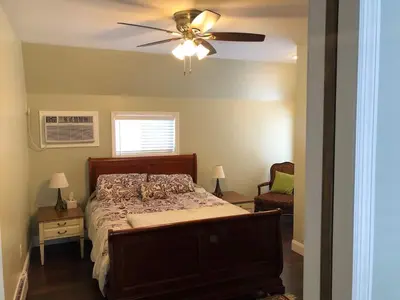 a bedroom with a bed and a ceiling fan at 1st Class Rentals Cooperstown New 3 Bedroom House in Cooperstown