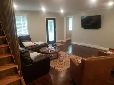 a living room with a couch and a table at 1st Class Rentals Cooperstown New 3 Bedroom House in Cooperstown