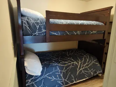 a couple of bunk beds in a room at Doveberry Inn in West Dover